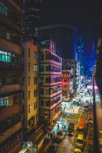 High angle view of illuminated buildings in city