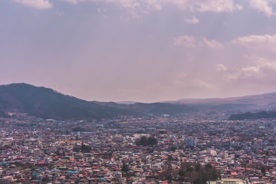 High angle shot of townscape against sky