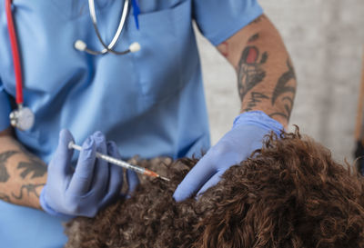 Midsection of woman with dog