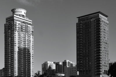 Low angle view of skyscrapers against sky