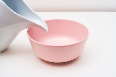 Close-up of coffee cup on table