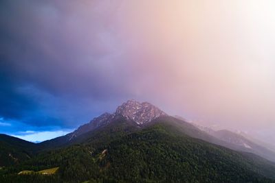 Scenic view of mountains against sky during sunset