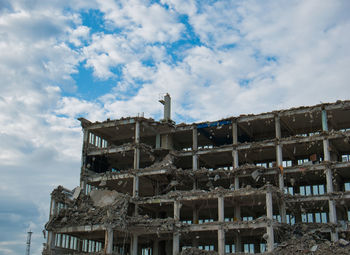 Low angle view of old building against sky