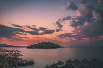 Scenic view of sea against sky at sunset