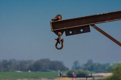 Low angle view of metal structure against sky