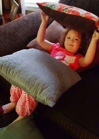 Woman sleeping on sofa