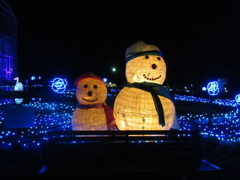 Illuminated christmas lights at night