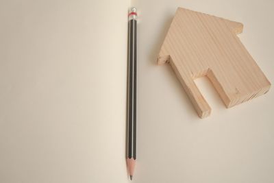 High angle view of pencil against white background