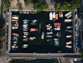 High angle view of boats moored in water