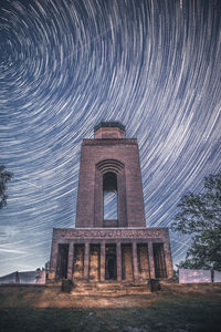 Low angle view of historical building against sky at night