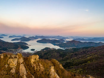 Scenic view of landscape against sky during sunset