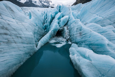 Frozen water in container