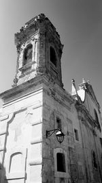 Low angle view of old building against sky