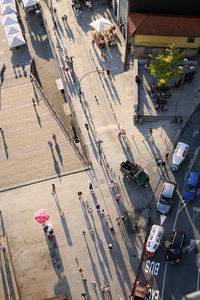 High angle view of people walking on street