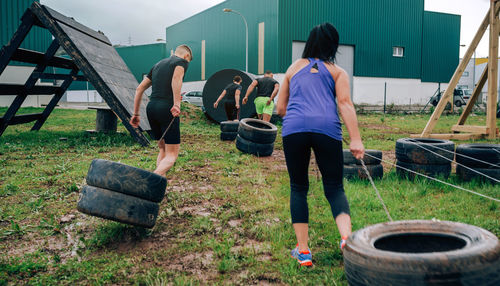 People standing on grassland
