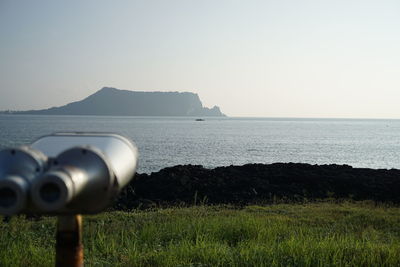 Scenic view of sea against clear sky