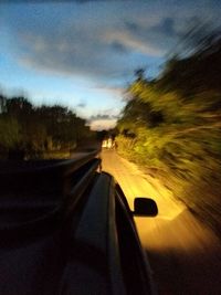 Blurred motion of car on road