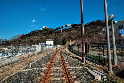 Railroad track against sky