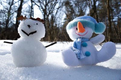 Close-up of stuffed toy on snow