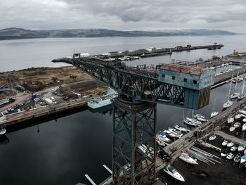 High angle view of bridge over sea against sky