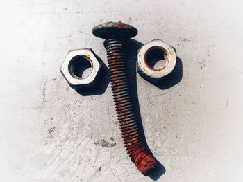 High angle view of rusty machine part
