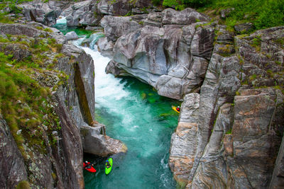 High angle view of rocks on sea