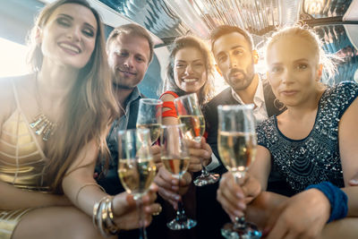  friends toasting with champagne 