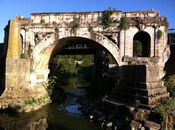 Arch bridge over river