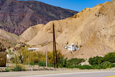 Scenic view of road amidst desert
