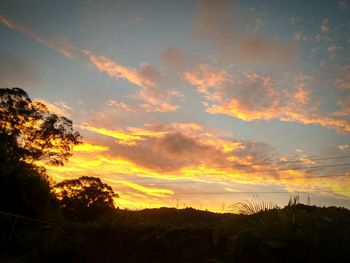 Scenic view of landscape at sunset