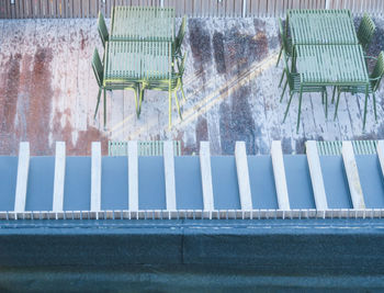 Wet swimming pool in city during rainy season