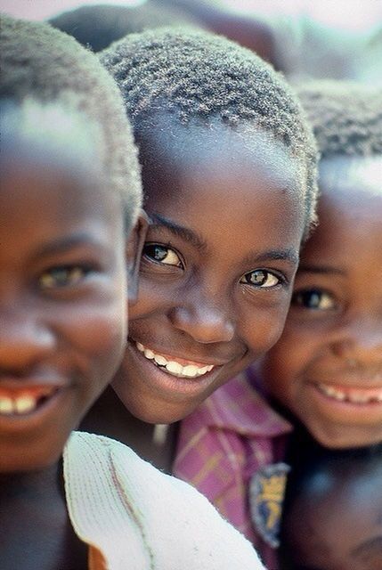 headshot, person, portrait, looking at camera, lifestyles, leisure activity, close-up, front view, smiling, head and shoulders, happiness, childhood, young adult, focus on foreground, human face, boys, elementary age, togetherness