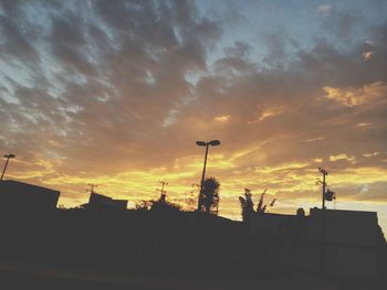 Low angle view of cloudy sky at sunset