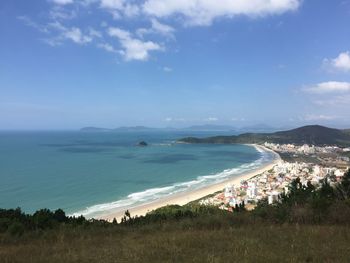 High angle view of people on beach against sky