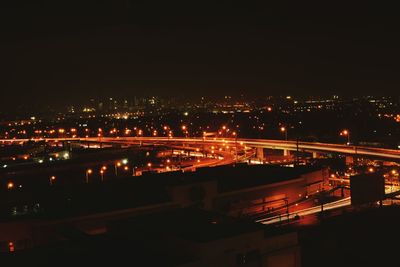 Illuminated cityscape at night