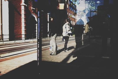 Woman standing in city
