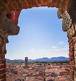 View of town against blue sky