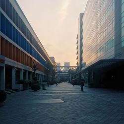 Modern buildings in city against sky