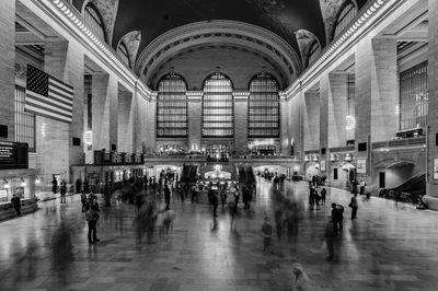 Group of people at railroad station