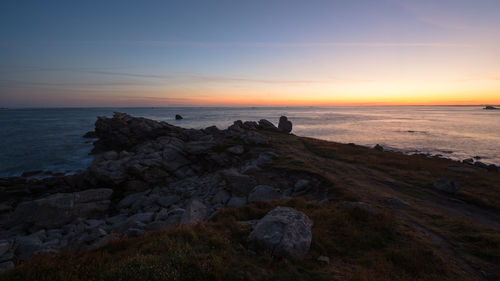 Scenic view of sea against sky during sunset