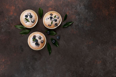 High angle view of blueberry muffins on table