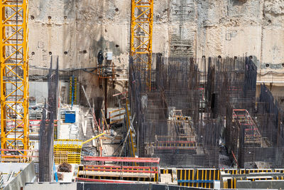 Construction site background. hoisting cranes and new multi storey buildings. industrial background