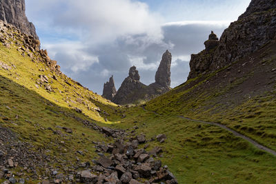 Panoramic view of rocky mountains against sky