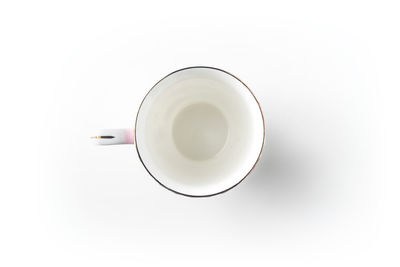 Directly above shot of coffee cup over white background