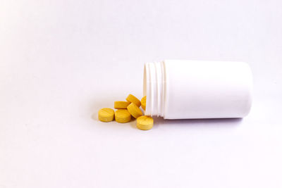 Close-up of fork over white background