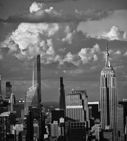 Buildings in city against sky