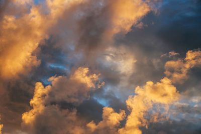 Low angle view of clouds in sky during sunset