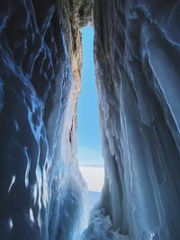 Panoramic shot of blue iced cave