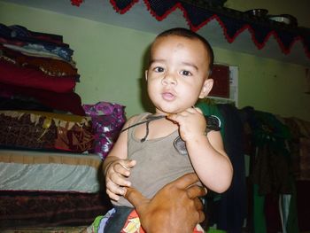 Portrait of cute baby girl at home