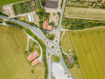 Aerial view of road amidst agricultural field